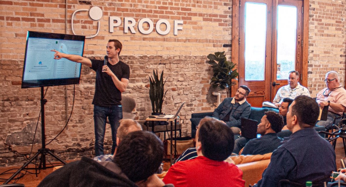 Man in a t-shirt giving a presentation