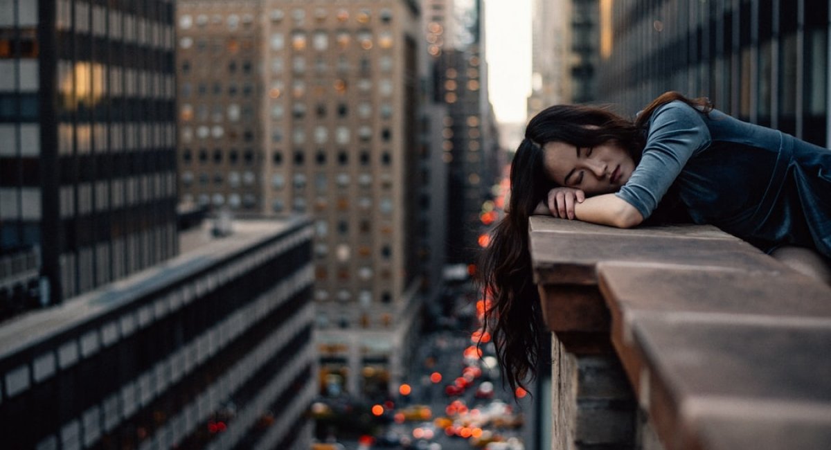 A woman sleeping on balcony