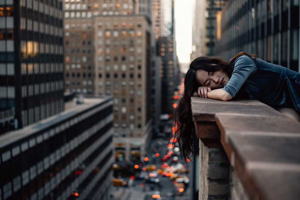 A woman sleeping on balcony