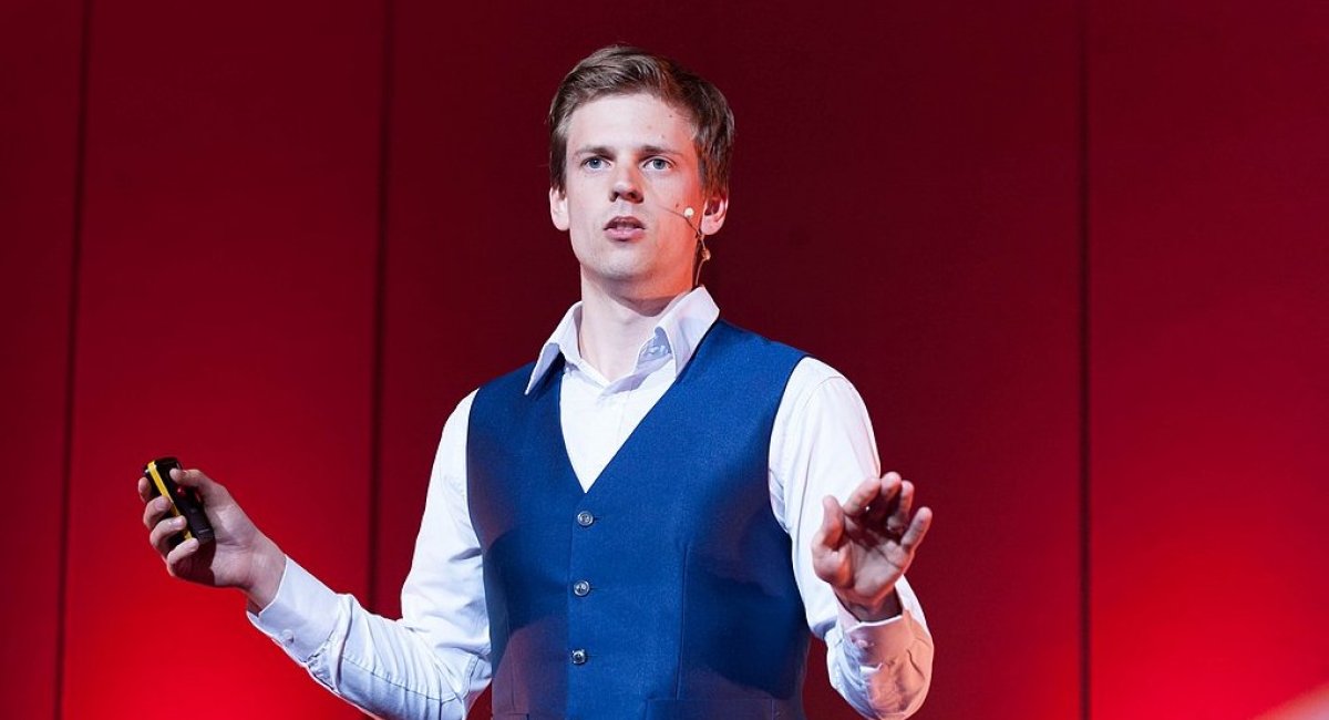 Man giving a speech on stage