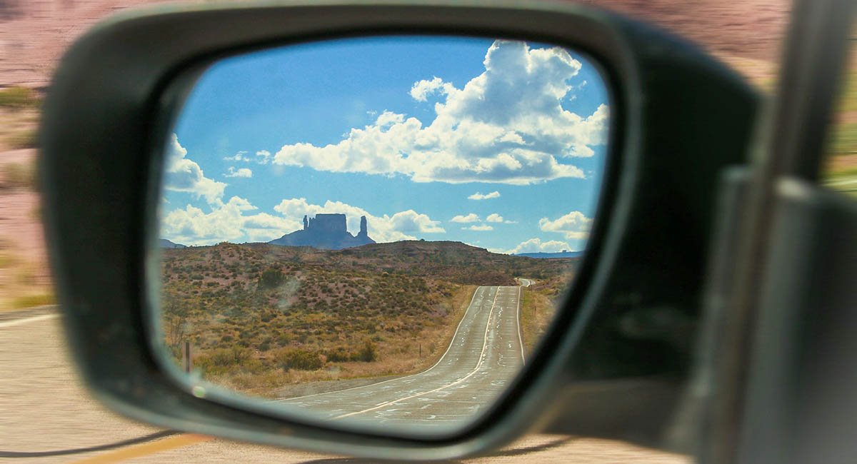 view of Moab desert in rearview mirror