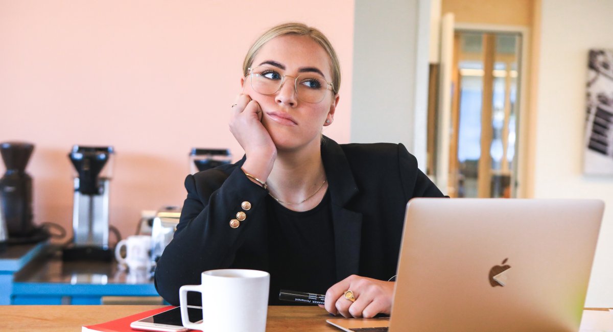 Woman working online with a computer